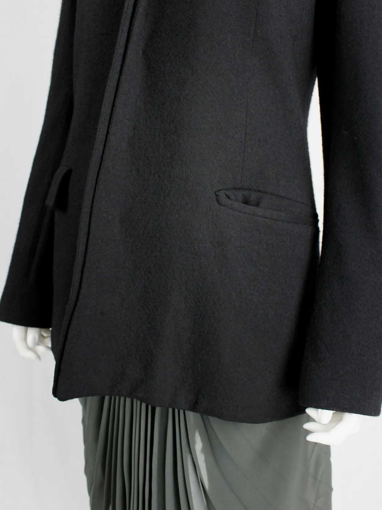 A.F. Vandevorst black wool coat with forward closing front and boning — fall 2000