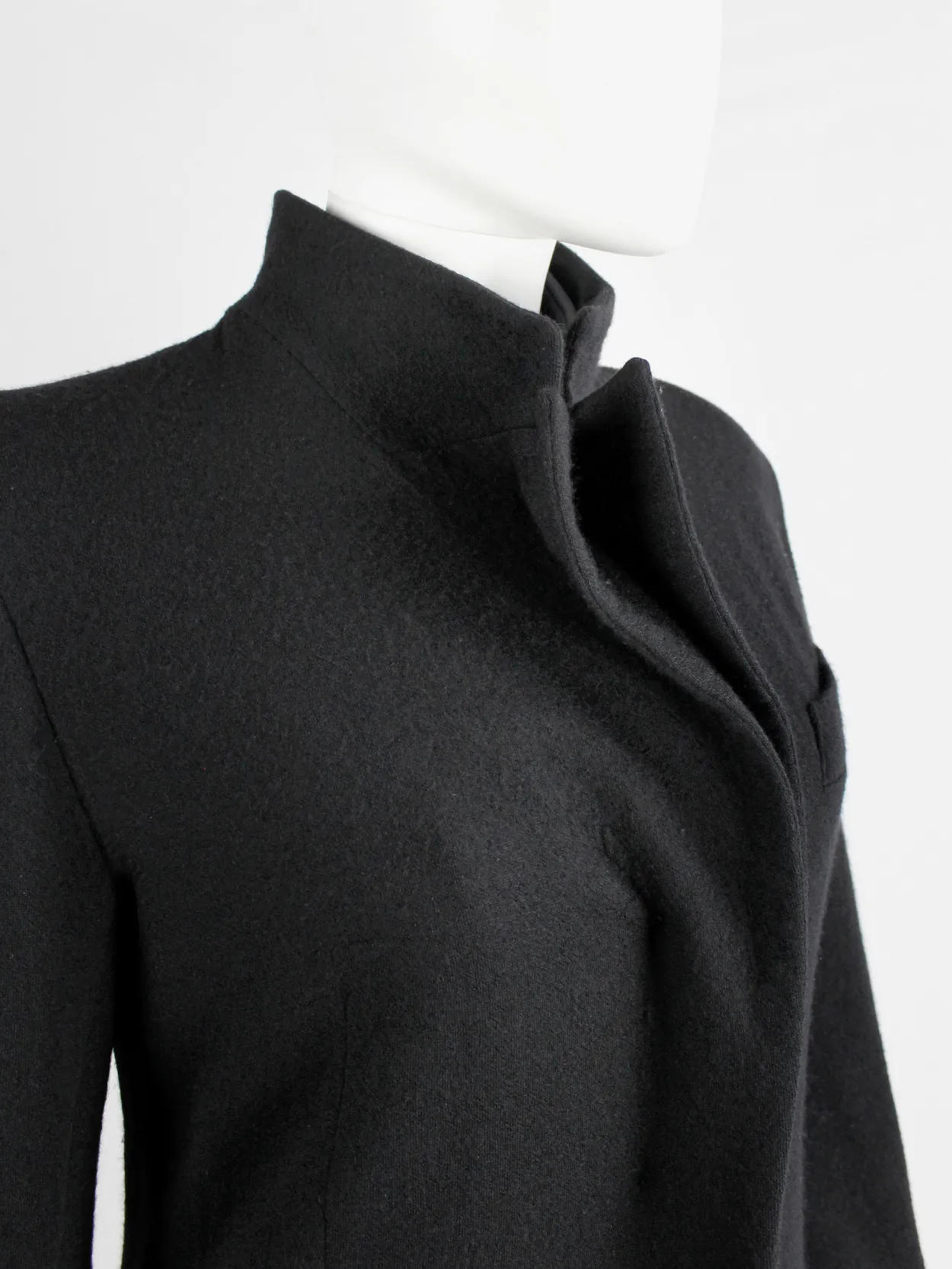 A.F. Vandevorst black wool coat with forward closing front and boning — fall 2000