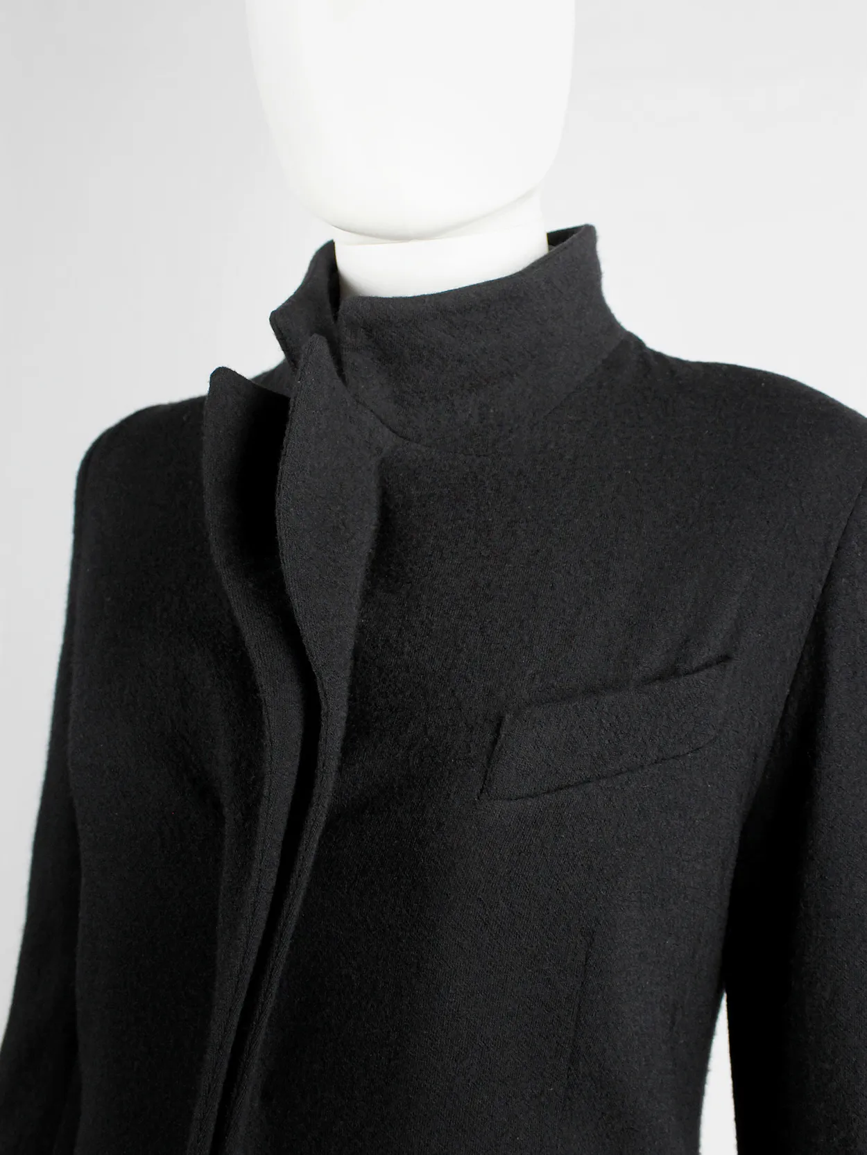 A.F. Vandevorst black wool coat with forward closing front and boning — fall 2000