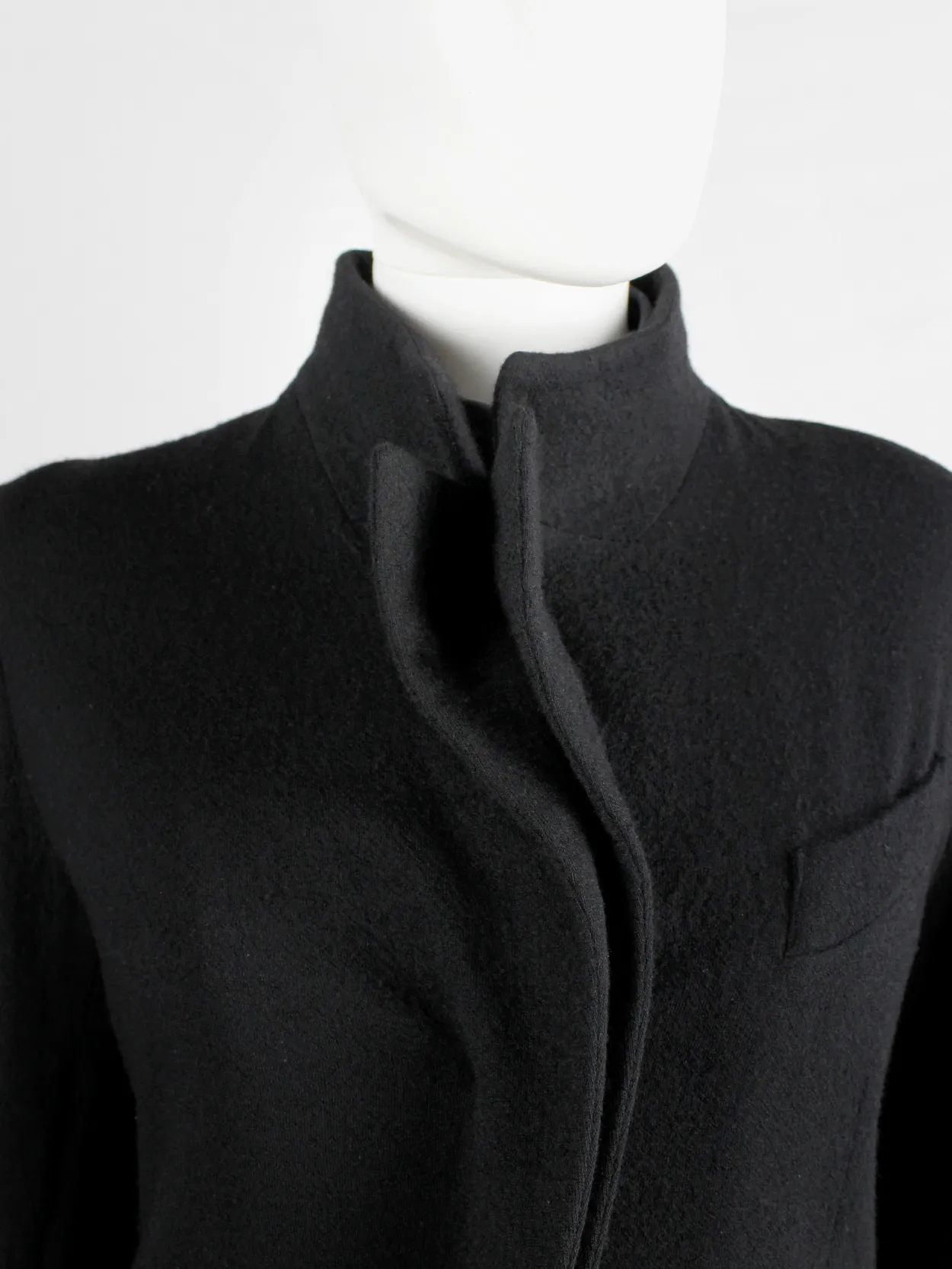 A.F. Vandevorst black wool coat with forward closing front and boning — fall 2000